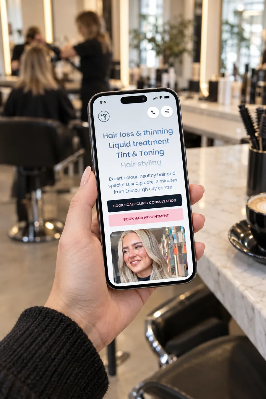 The PeterJames website on a phone, in the salon